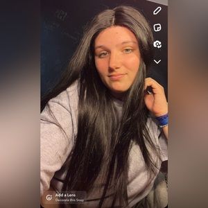 Very long real hair, can’t change part, dark black, love claw clip look.